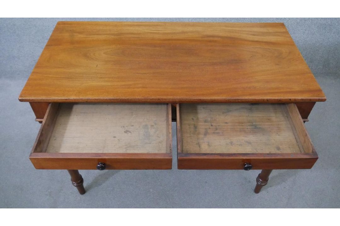 A Victorian mahogany two drawer side table, of rectangular form, on turned legs. H.75 W.107 D.53cm - Image 3 of 6