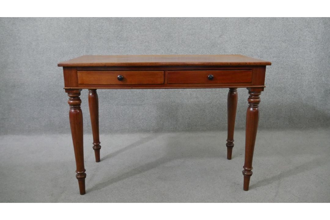 A Victorian mahogany two drawer side table, of rectangular form, on turned legs. H.75 W.107 D.53cm - Image 1 of 6