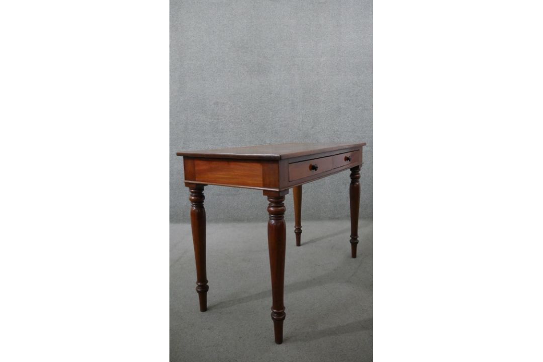 A Victorian mahogany two drawer side table, of rectangular form, on turned legs. H.75 W.107 D.53cm - Image 6 of 6