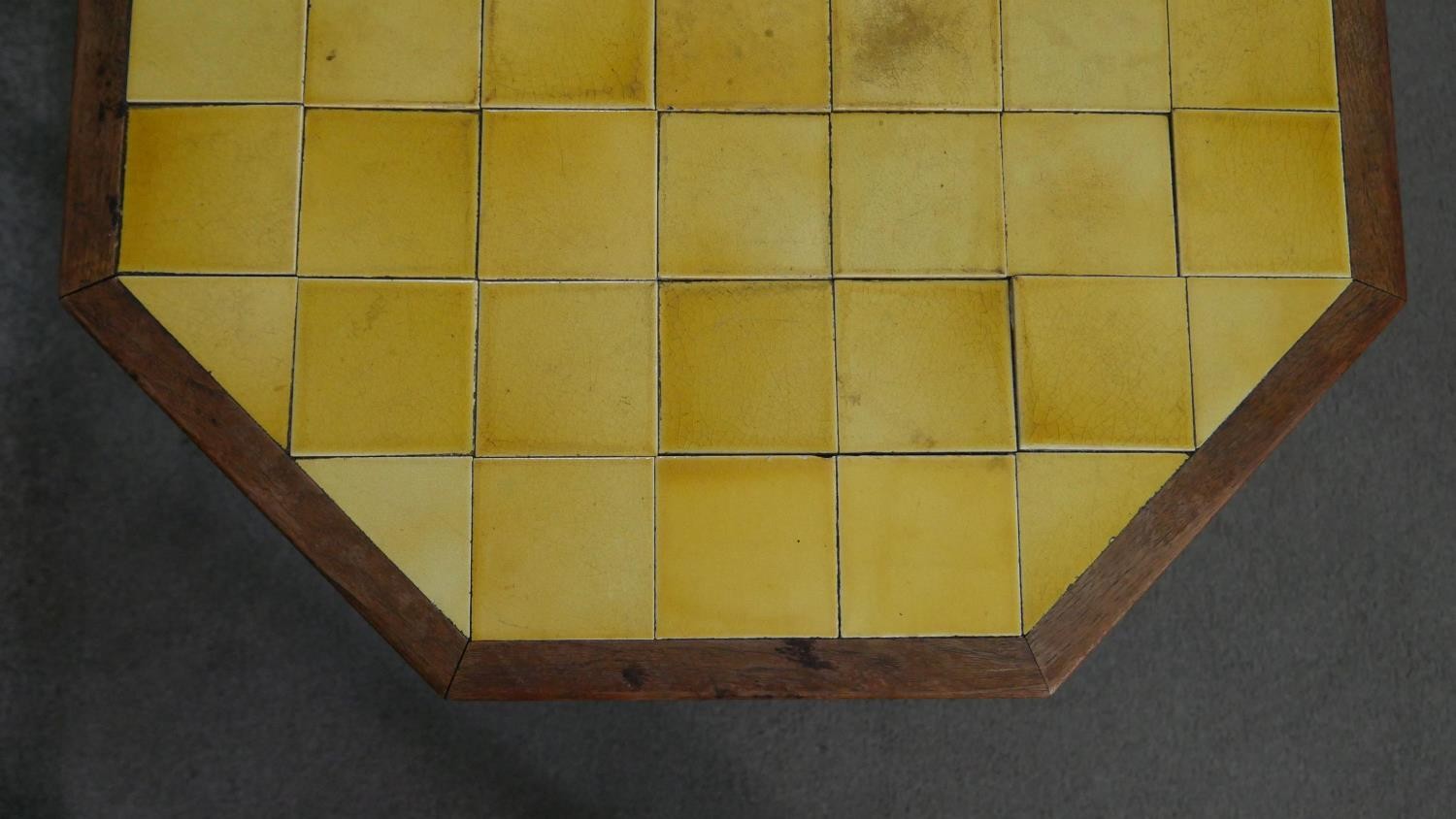 A circa 1900 Liberty & Co Anglo-Mooresque octagonal table, the top with yellow tiles, on eight - Image 4 of 8