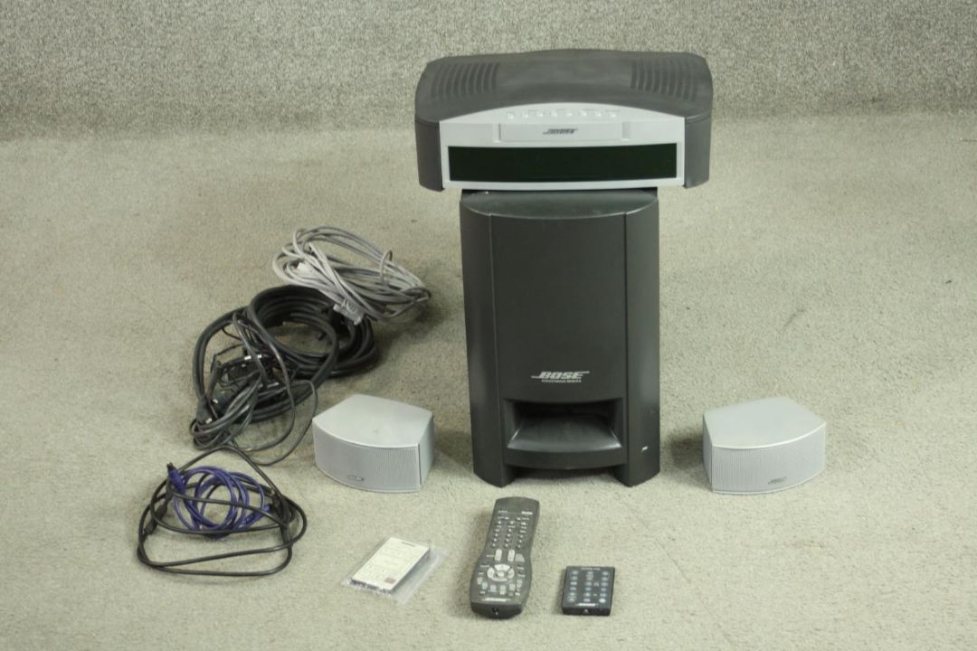 A Bose PS3-2-1 media centre with subwoofer, two speakers, cables and two remote controls. H.36 W. - Image 1 of 8