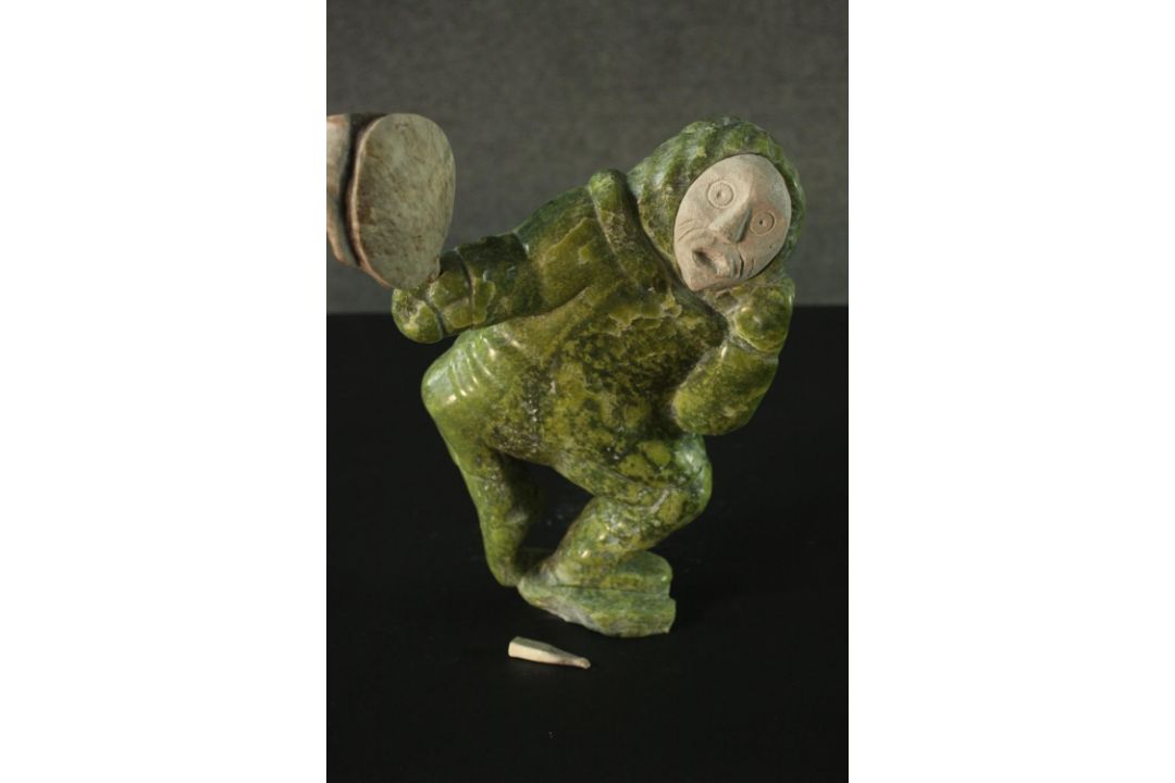 Aisa Amittu, Inuit, 1951, a carved green soapstone and granite drum dancer sculpture, with bone - Image 5 of 9