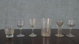 A collection of six 19th century hand blown glasses, including a Georgian toast masters glass and