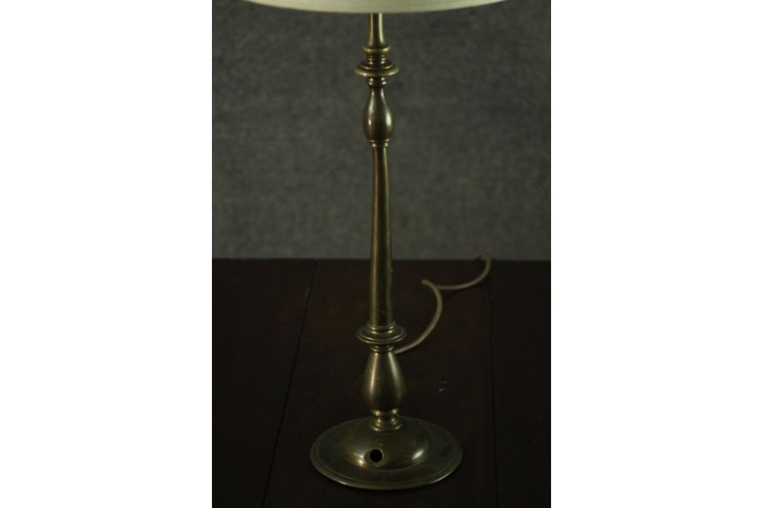 A turned brass table lamp, with an ivory coloured shade. H.56 W.25cm. - Image 4 of 4