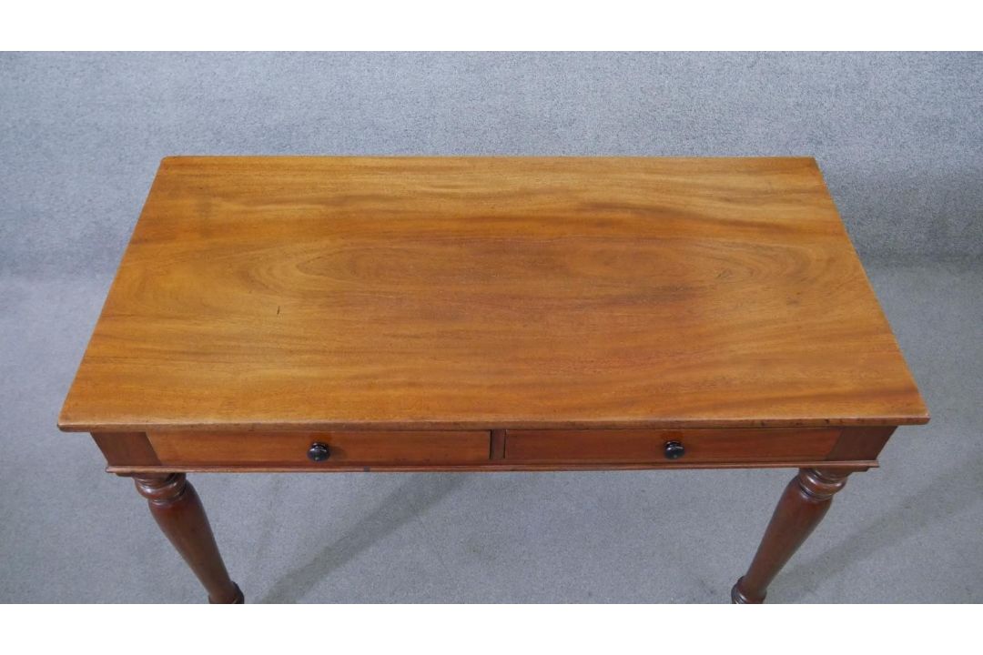 A Victorian mahogany two drawer side table, of rectangular form, on turned legs. H.75 W.107 D.53cm - Image 2 of 6