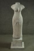 A carved sandstone torso figure of a female deity on stepped base, Baphuan style. (restored). H.