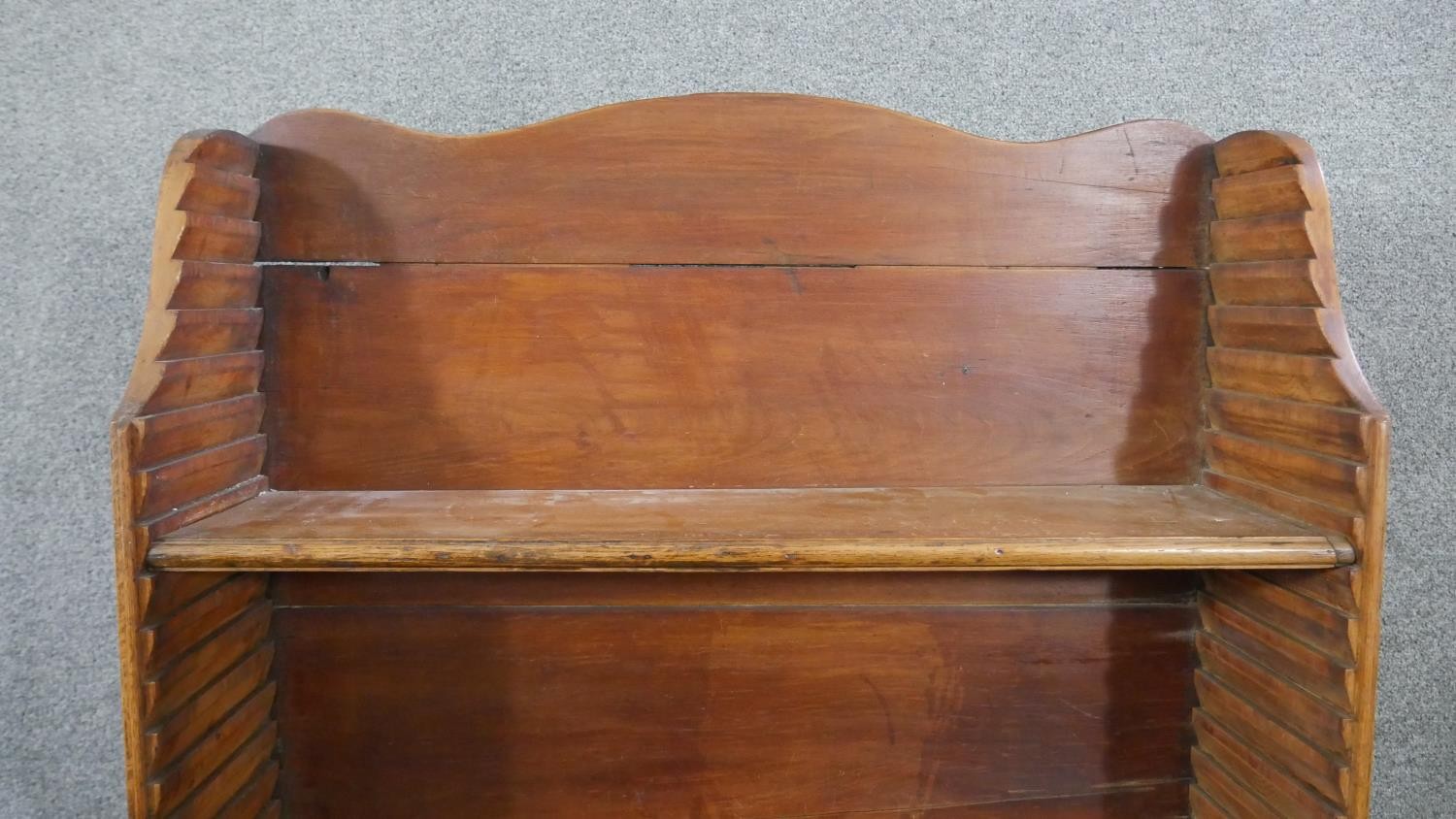 A George III pine waterfall style bookcase, with a shaped top, over four adjustable shelves, on - Image 5 of 8