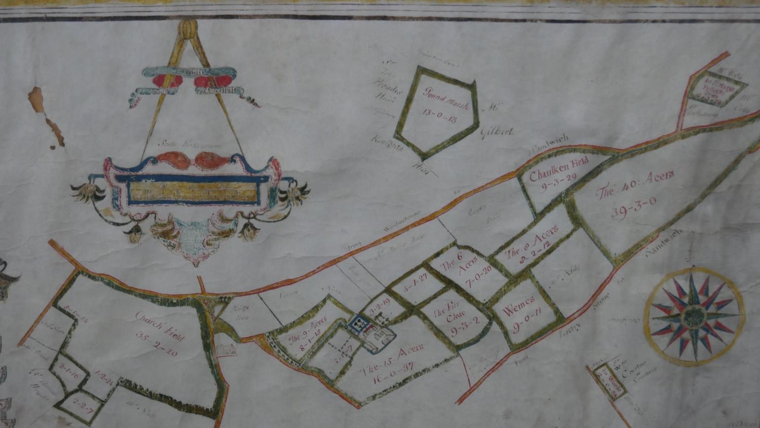 A framed and glazed 17th century hand drawn map showing the land owned by the Manor of Grove, with