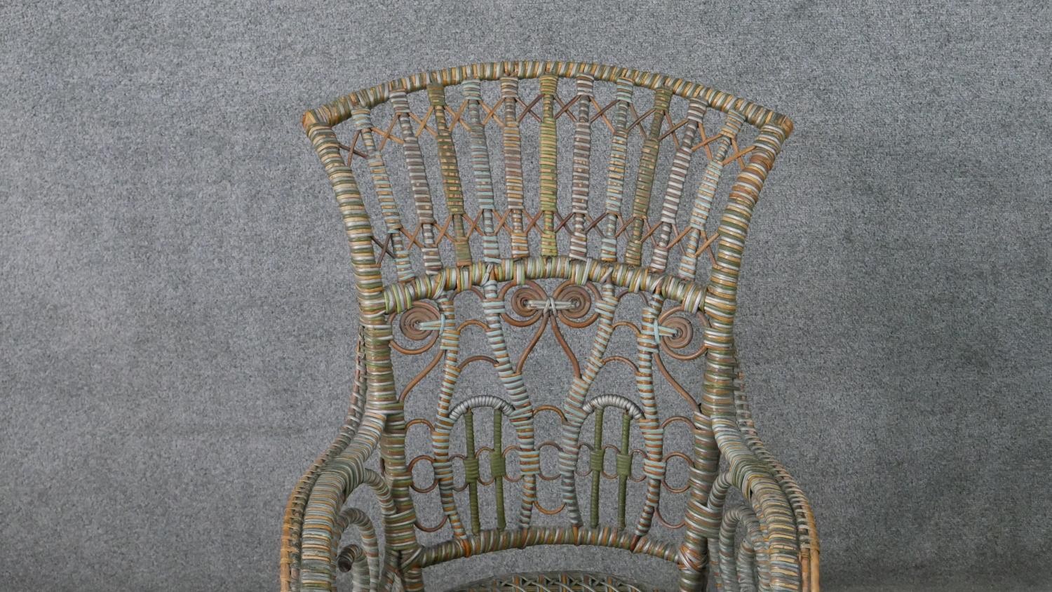 A wicker open arm conservatory chair, the back with cross and spiral detail, the arms with scrolling - Image 3 of 6