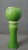 A Victorian green glazed majolica globe planter and pedestal stand. H.94 W.35cm (on stand)