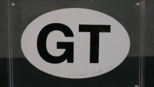 Gavin Turk, 1967, a framed signed personal monogram in perspex, dated 2007. H.12 W.17cm (largest)