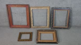 A collection of five painted and carved picture frames, some with gilded detailing. H.72 W.60cm. (