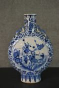 A late 19th-early 20th century Chinese large blue and white porcelain moon vase, decorated with a