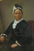 A framed and glazed oleograph of a woman in a black dress with lace collar. H.41 W.36cm.