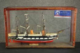 A scratch built model ship, 'Warrior 1861-1892' on stand, with a brass name plate, in a glazed