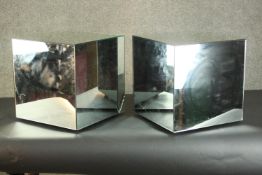 A pair of contemporary mirrored cubes (damaged as seen). H.40 W.40 D.40cm.