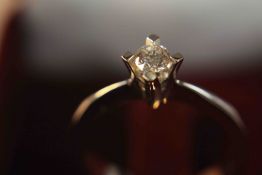 An 18ct white gold and round brilliant cut diamond solitaire ring, approx. 0.35cts, marked 750, size