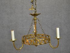 An Edwardian gilt metal three branch chandelier with foliate design and acanthus finial. H.42 Diam.