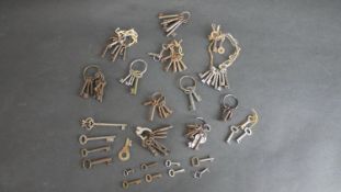 A large collection of approximately fifty antique keys.