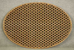 A large Indian carved and pierced oval panel. H.76 W.116cm.