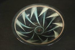 An Art Deco style stylised design hand painted art pottery footed bowl, monogrammed CF to base. H.
