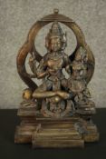 A large 20th century brass figure of an Indian deity. H.32 W.20 D.12cm.