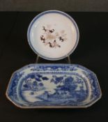 A 19th century Chinese blue and white hand painted octagonal platter, decorated with a river