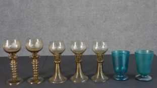 A collection of five early 20th century Fritz Heckert style roemer wine glasses with etched vine