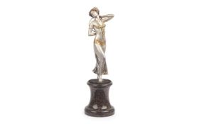 GOTTHILF JAEGER (GERMAN, 1871-1933): A SILVER AND GILT BRONZE FIGURE OF A DANCING GIRL