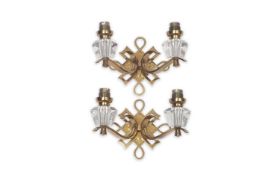 A PAIR OF LACQUERED BRONZE WALL LIGHTS IN THE MANNER OF GILBERT POILLERAT (1902-1988)