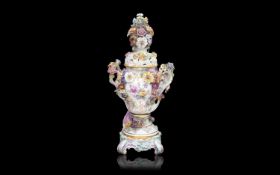 A FINE MONUMENTAL FLOWER ENCRUSTED MEISSEN VASE AND COVER, LATE 19TH / EARLY 20TH CENTURY