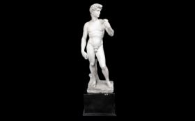 A LARGE 19TH CENTURY ITALIAN MARBLE FIGURE OF DAVID AFTER MICHELANGELO