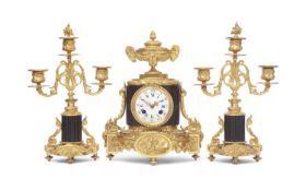 A 19TH CENTURY PATINATED AND GILT BRONZE MANTEL CLOCK SET