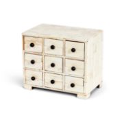 A BONE VENEERED MINIATURE COLLECTOR'S CABINET