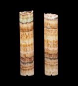 A PAIR OF CARVED MEXICAN ONYX COLUMN FORM LAMP BASES