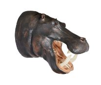 A REPLICA TAXIDERMY HIPPOPOTAMUS HEAD