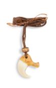 AN AFRICAN LION CLAW PENDANT