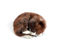 A SMALL TAXIDERMY KITTEN