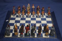 A BOXED STUDIO ANNE CARLTON CHESS SET BRITISH AND SCOTTISH SOLDIERS