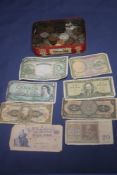 A TIN OF BRITISH WORLD COINS AND BANK NOTES