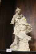 A CHALK BUST OF SALOME TOGETHER WITH AN ART NOUVEAU STYLE LADY