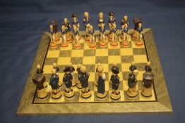 A BOXED STUDIO ANNE CARLTON CHESS SET |BATTLE OF TRAFALGAR|
