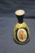 A PAINTED DECORATIVE VASE