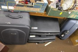 A QUANTITY OF ASSORTED SUITCASES