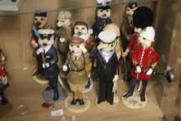ELEVEN COUNTRY ARTISTS MEERKAT FIGURES TO INCLUDE SHERLOCK HOLMES, POLICE AND MILITARY TYPES