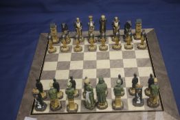AN UNBOXED PAINTED STUDIO ANNE CARLTON SHERLOCK HOLMES CHESS SET