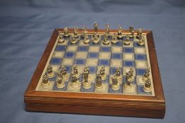 A WHITE METAL CHESS SET