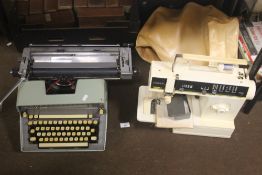 A SINGER SEWING MACHINE TOGETHER WITH A TYPEWRITER AND UMIG PROJECTOR ETC.