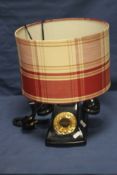 A TELEPHONE TABLE LAMP