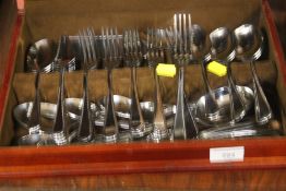 A CANTEEN OF STAINLESS STEEL CUTLERY